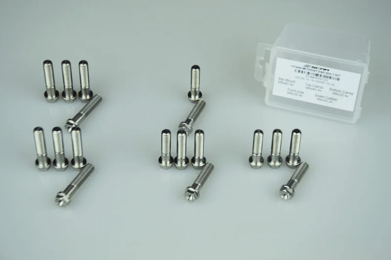 Kit tornillería eje delantero SCAR Titanio