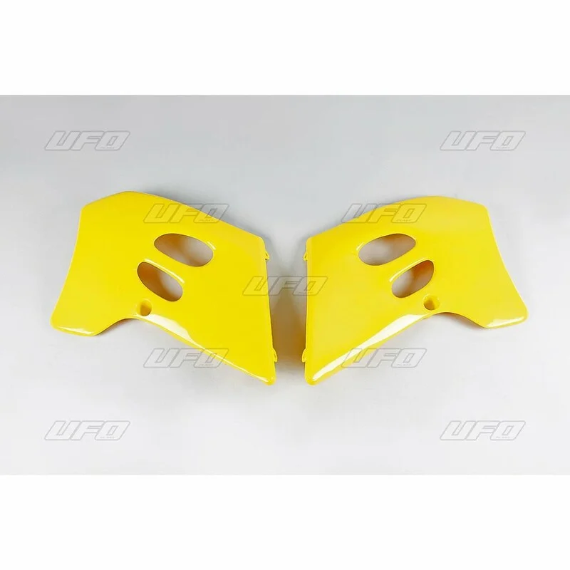 Plásticos laterales de radiador UFO Suzuki amarillo SU02945-101